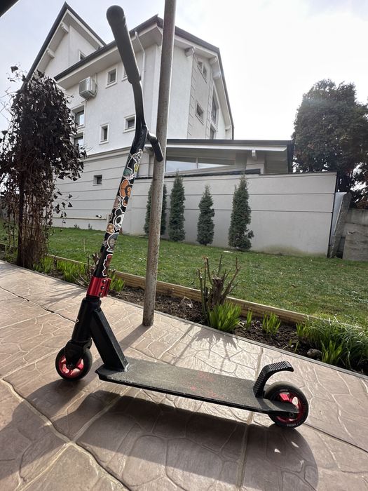 Vand trotineta freestyle negru/rosu in stare buna