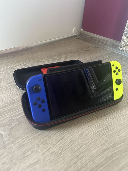 Nintendo switch blue and yellow edition with 3 games