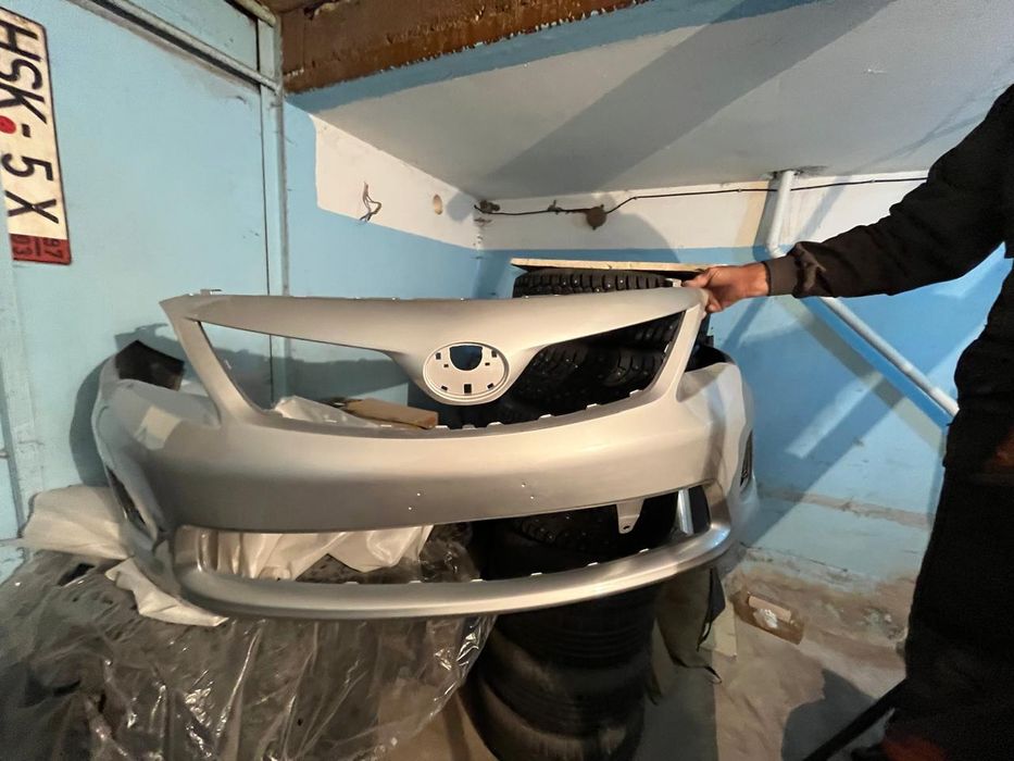 Передний бампер Toyota corolla