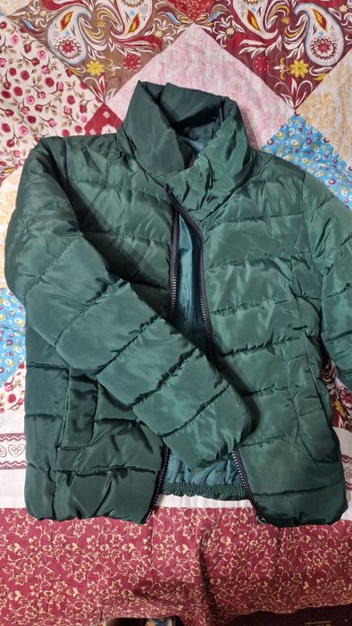 Куртки и пальто для девочки