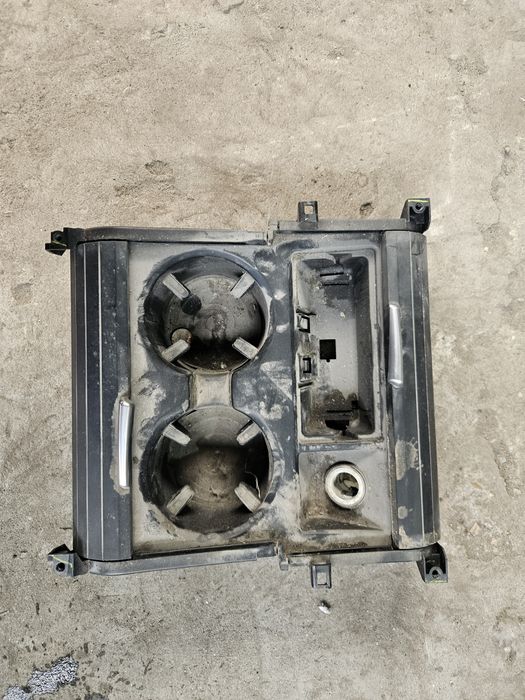 Поставка за чаши Bmw e70