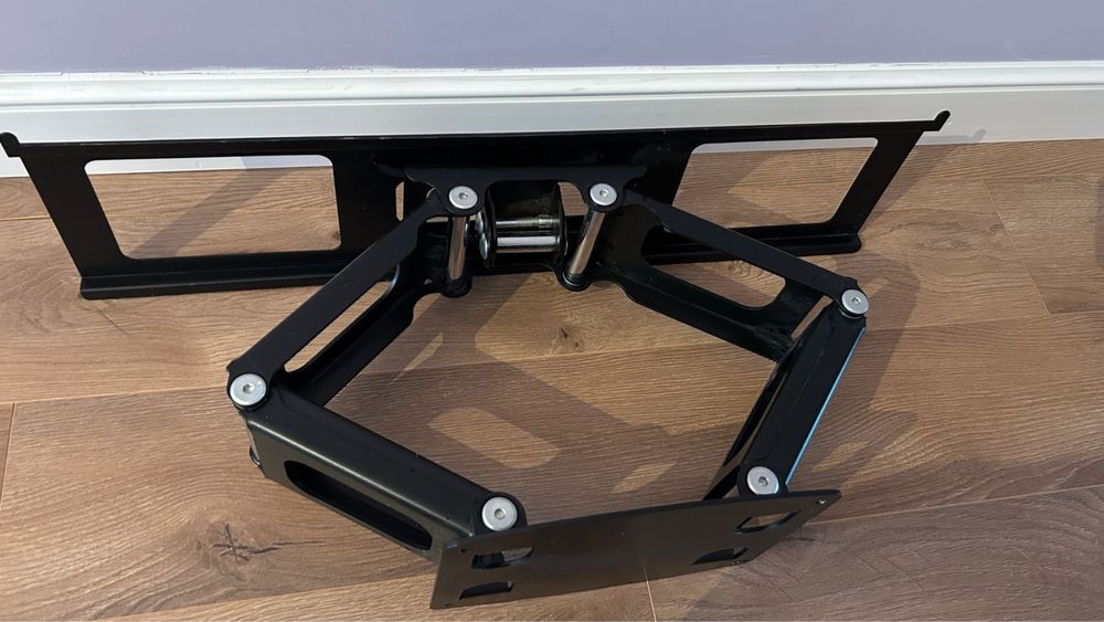 Продам кронштейн новый