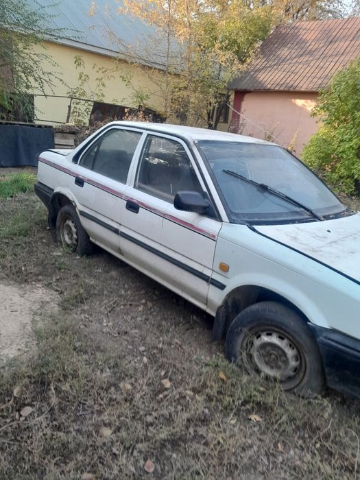 Тойота  королла.