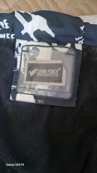 Продам пуховик подростковый