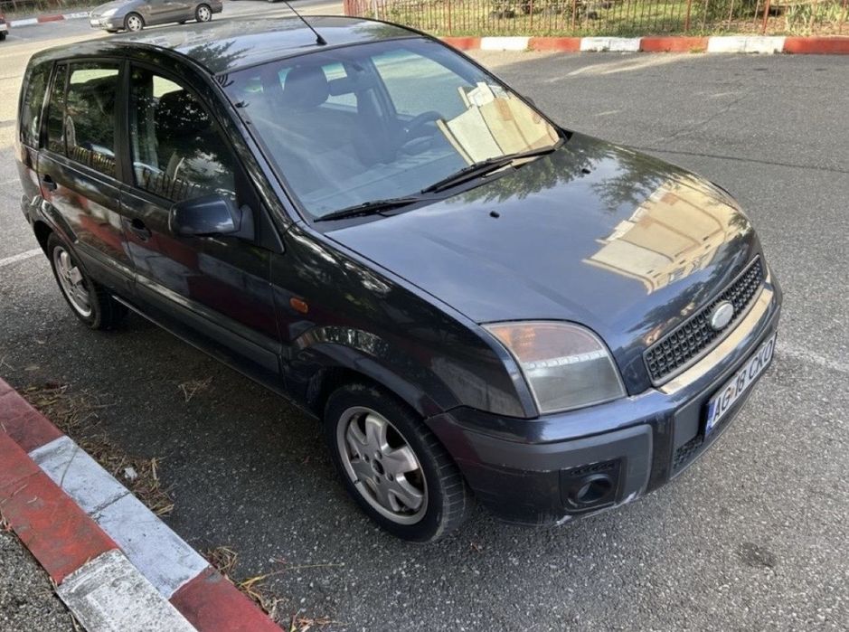 Ford Fusion 1.4 benzina pe gpl nare nici un cu defect accept schimb