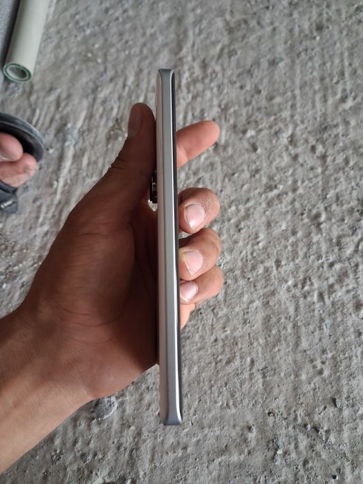 Xiaomi HyperOS ..