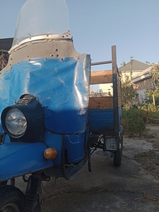 Муравей, мотоцикл