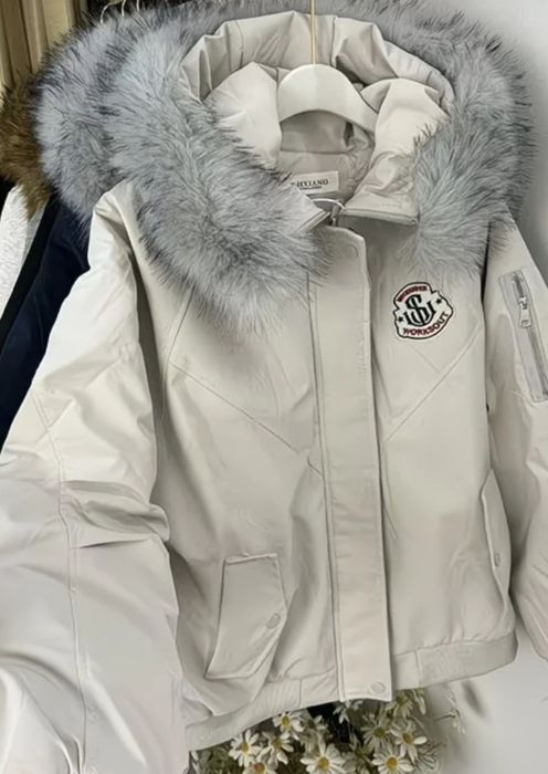 Продам пуховик на 12-14 лет