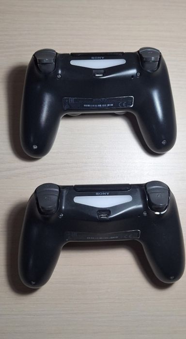 PS4 Slim 1TB - Pachet Complet: 2 Manete + 4 Jocuri