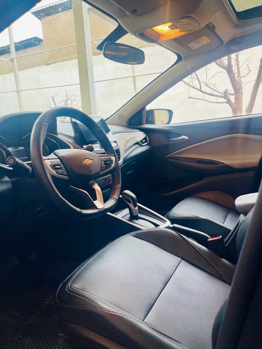 Onix premier 2 turbo AT plus