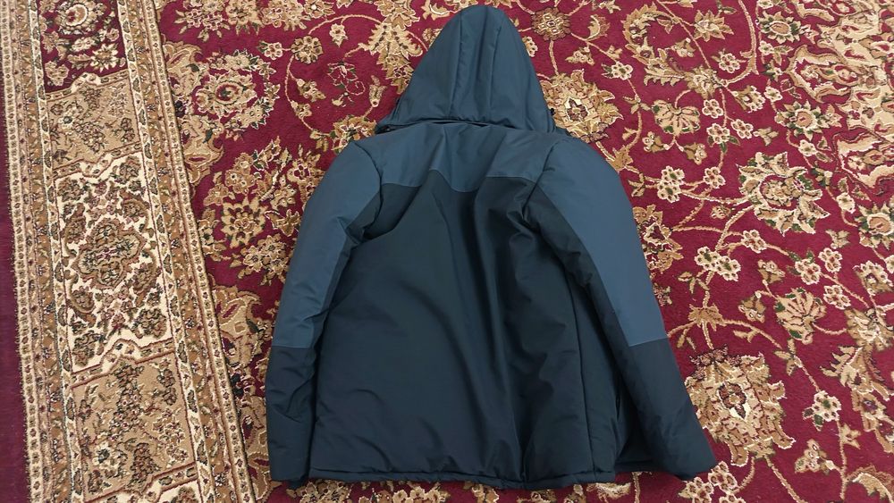 Куртка  новый 52 размер.