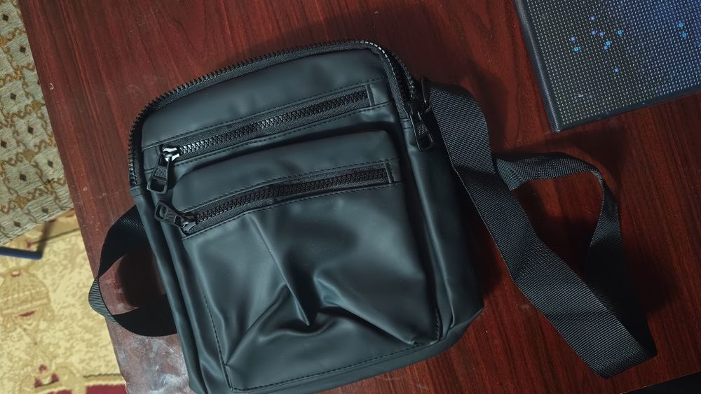 Барсетка новая..