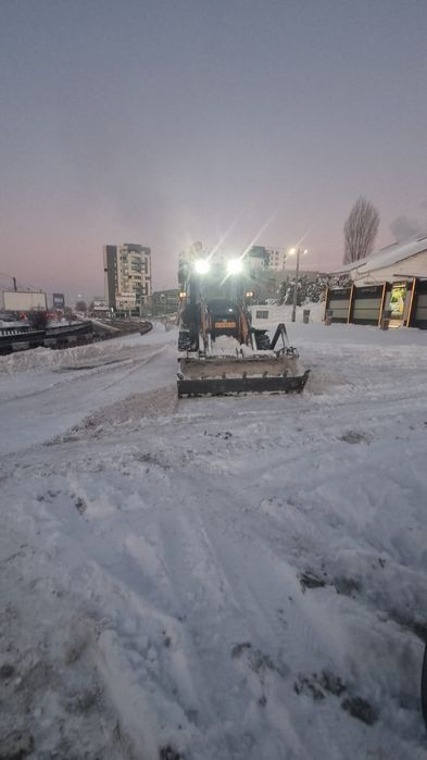 Inchiriere Buldoexcavator Iasi (deszăpezire, sapaturi, nivelare, etc)