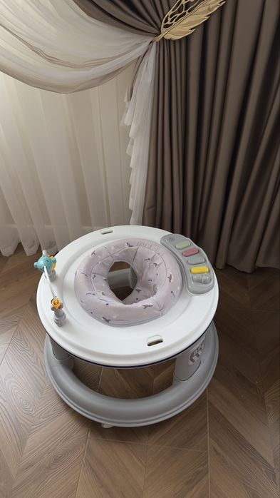 Детские ходунки с игрушками и музыкальные