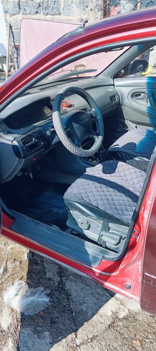 Машина Мазда кронус