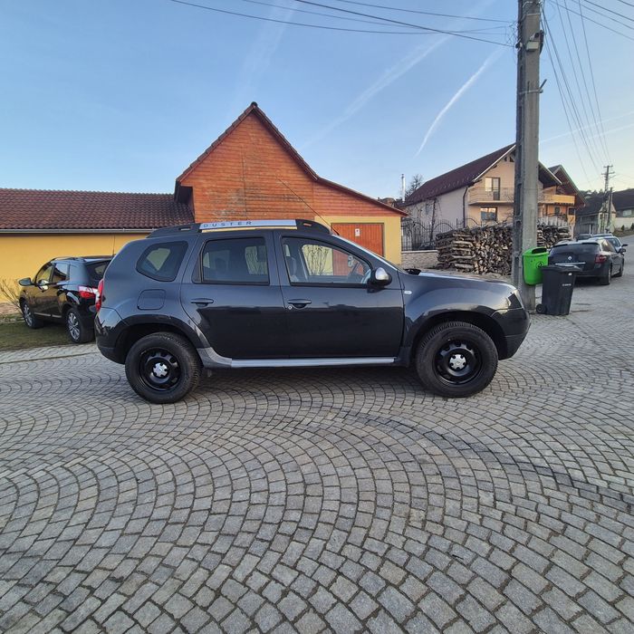 Dacia Duster , benzina ,euro 5 , clima functionala , piele , navi , Rate ,Germania ,2014