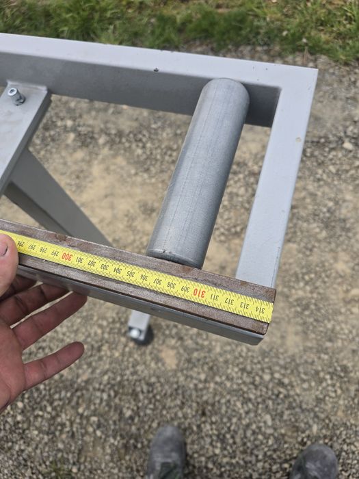 Conveior cu role transportatoare si măsurare  pentru debitare