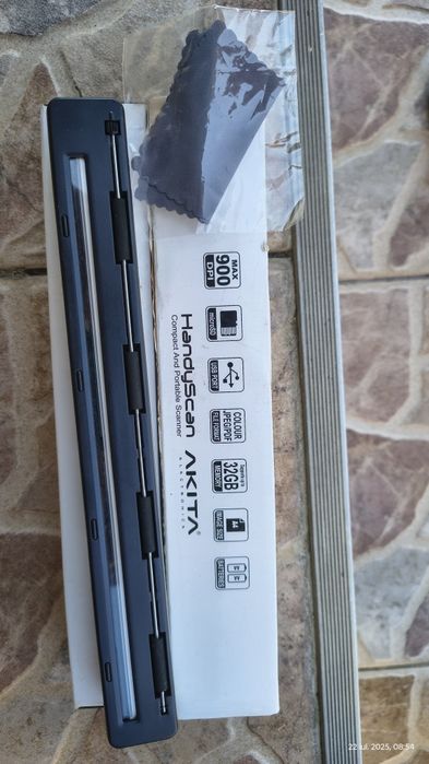 Scanner portabil Akita
