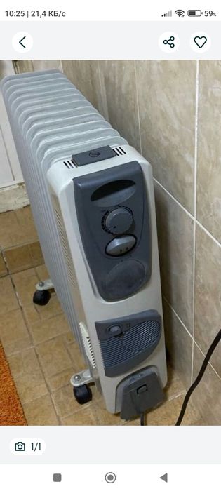 Масляный одиннадцати секционный обогреватель.