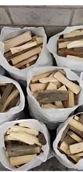 Дрова в мешках пиленые