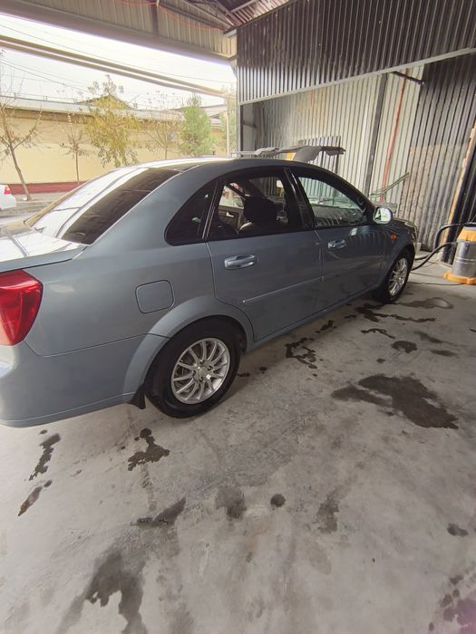 Лачетти 1.8 2013 газ