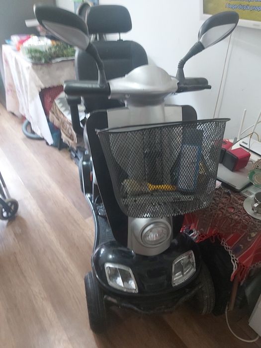 Căruț electric pentru persoane cu dizabilități