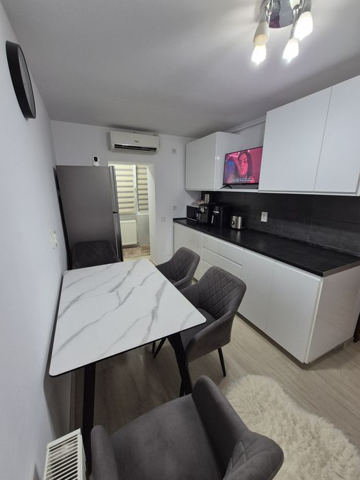 Apartament cu 2 camere  complet mobilat si utilat.