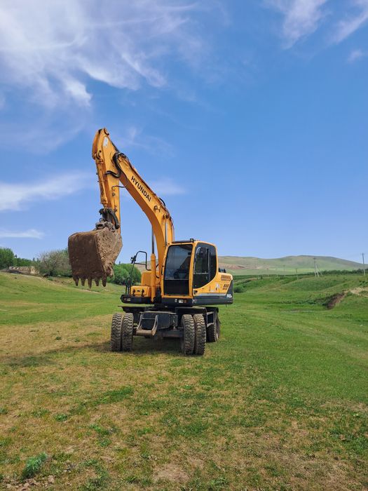 Экскаватор погрузчик хова