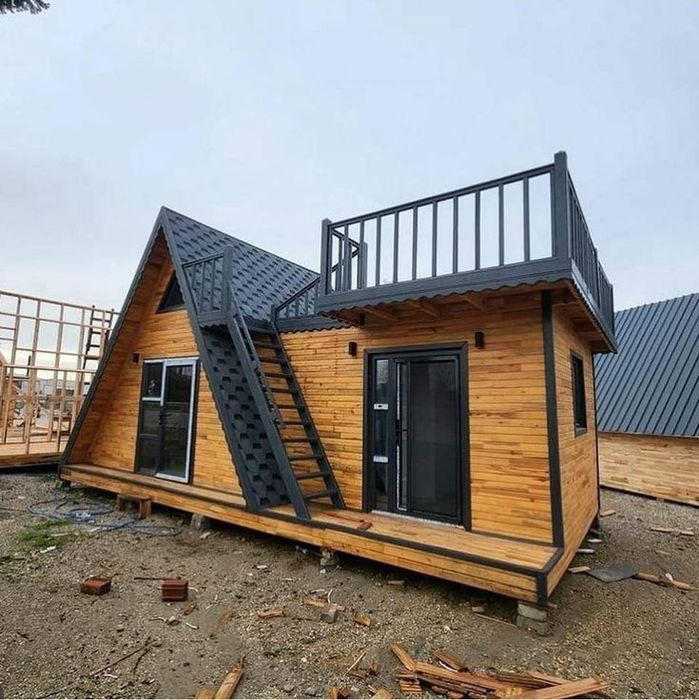 Cabane din lemn cu două dormitoare living și bucătărie plus baie