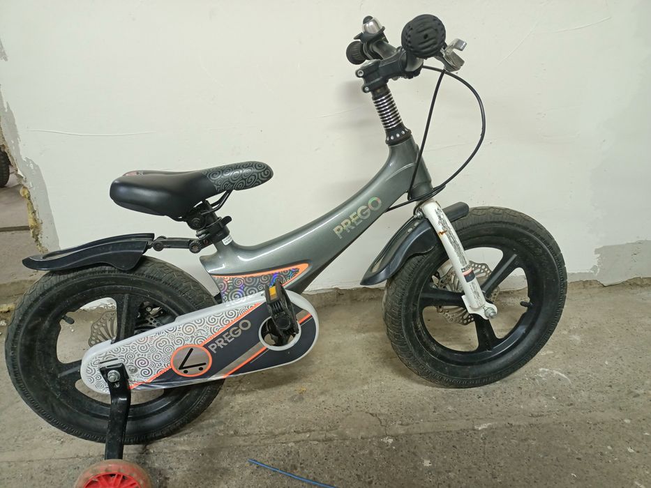 Продам детский велосипед с алюминиевой рамой..