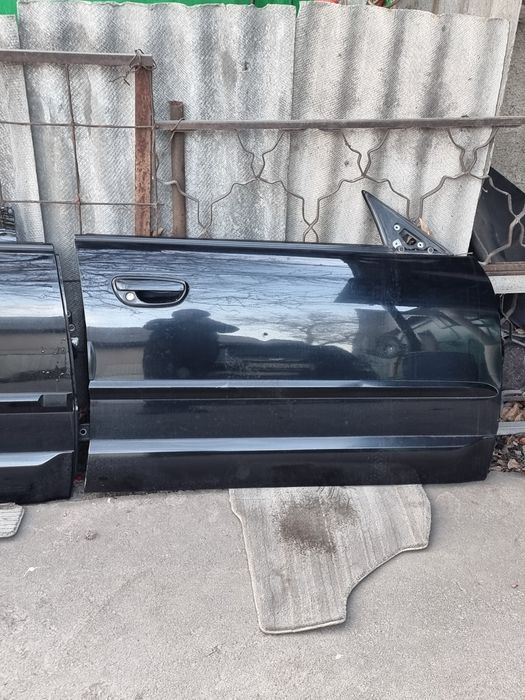 Двери на Subaru Outback BP.