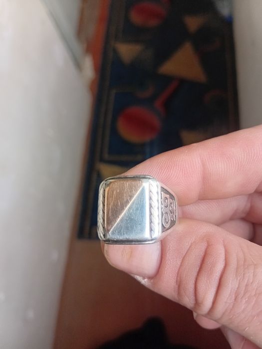 Печатка серребро с золотом.