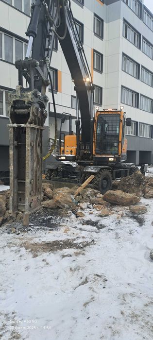 Колёсный экскаватор Хундай 180