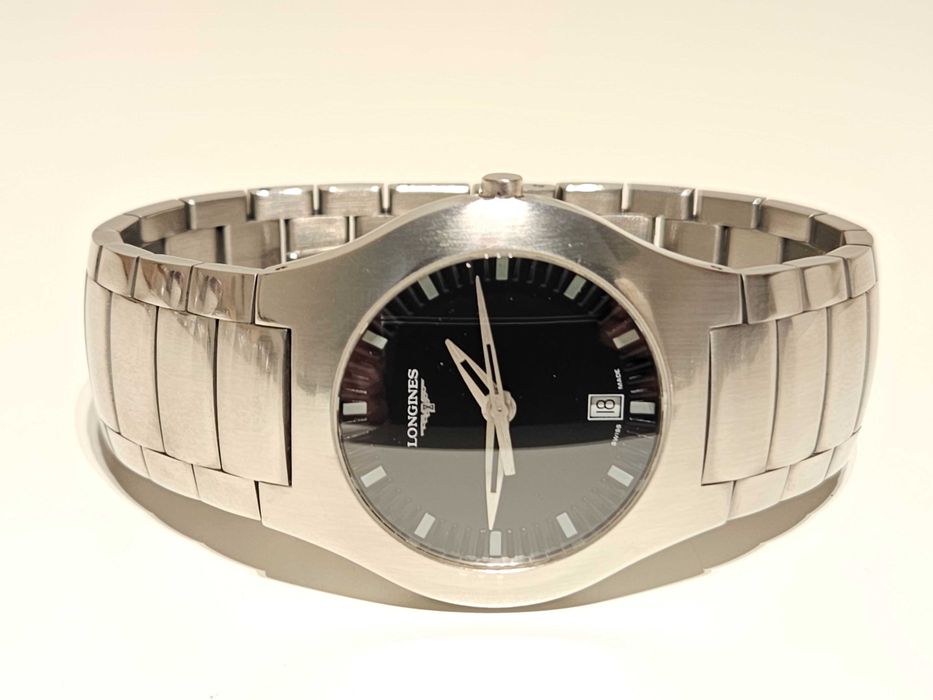 Продаван елегантен стомана кварц мъжки  дамски часовник"Longines"