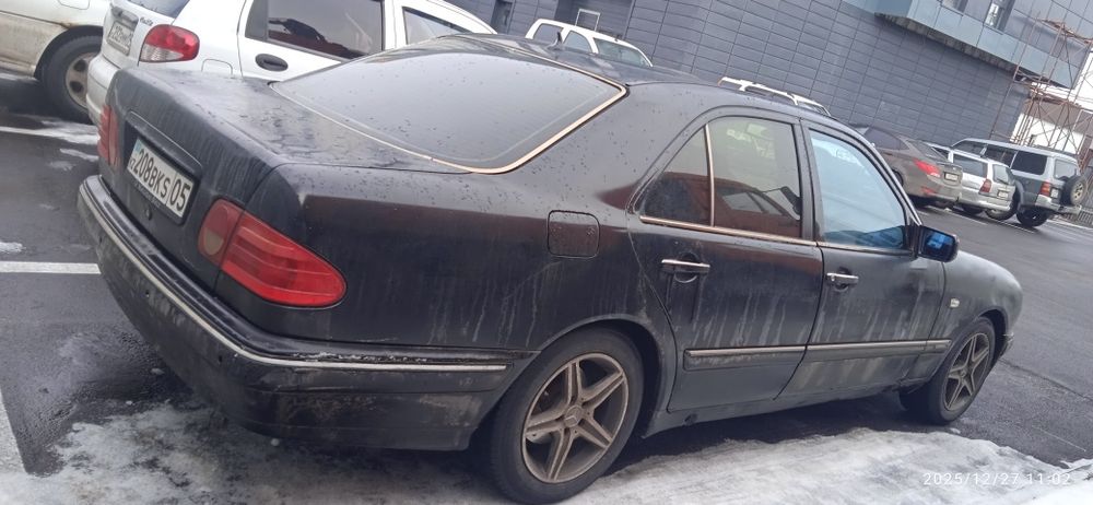 Мерседес 210 бенс