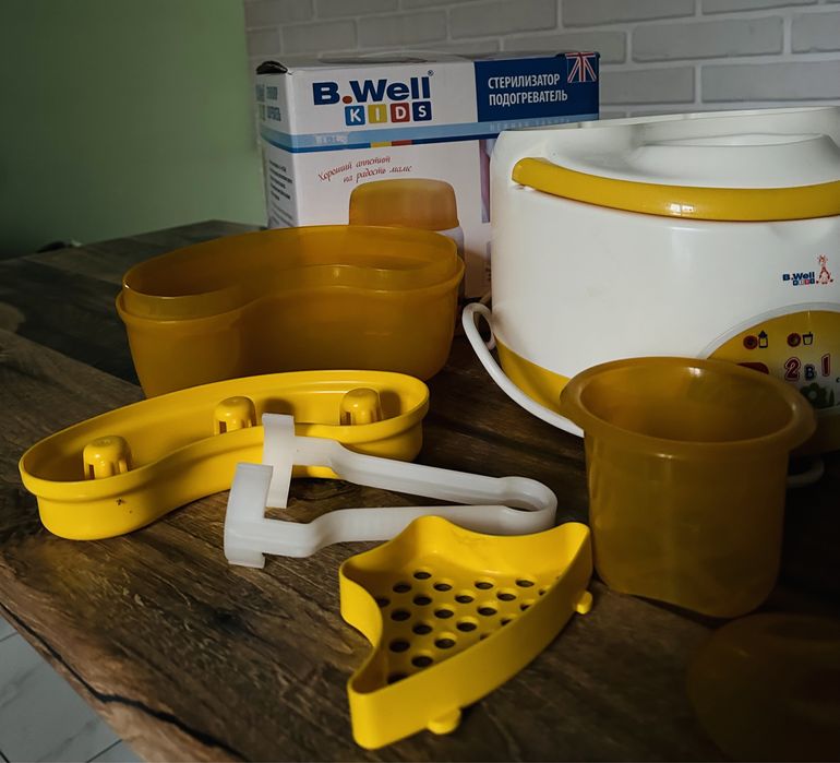 Стерилизатор - подогреватель для детских бутылочек, сосок и тд