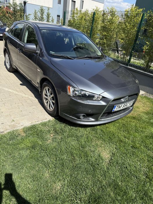 Vand sau schimb mitsubishi lancer!