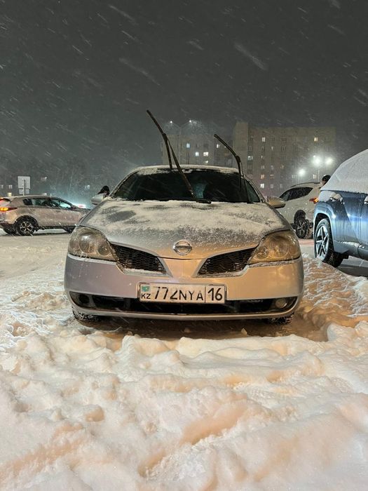 Ниссан примера 2003