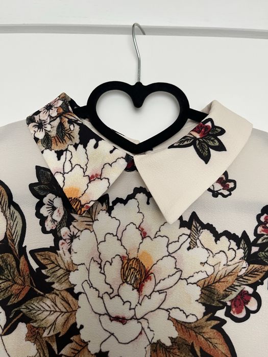 Bluza eleganta ivoar cu imprimeu floral