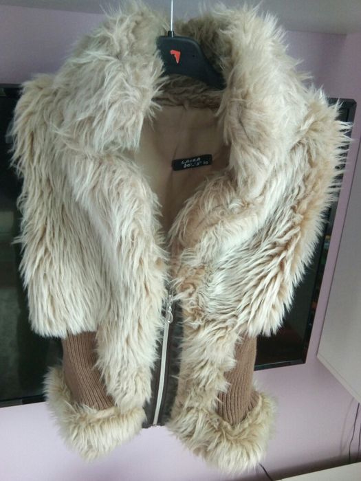 Vesta blana artificiala