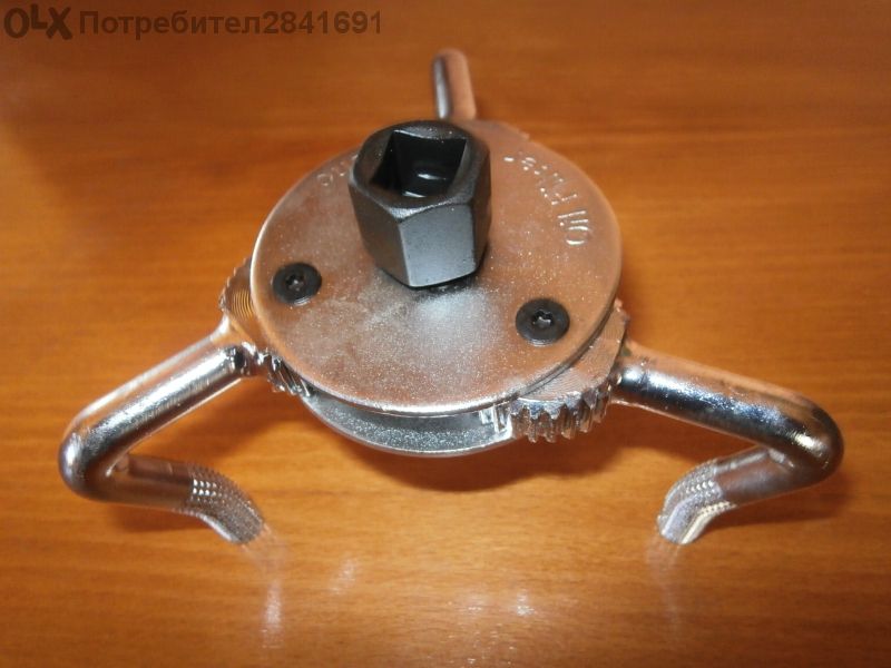 Ключ, скоба / паяк / за маслен филтър.