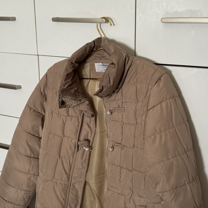 Kurtka qishki ayollar va qilar uchun