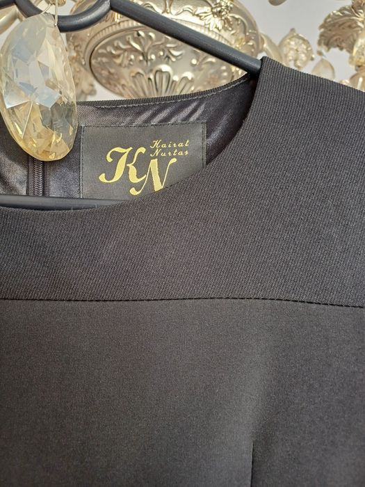 Пиджак с юбкой очень красивый