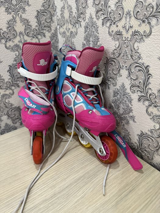 Срочно продаю ролики в очен хорошем состояние размер 34/36 подходять