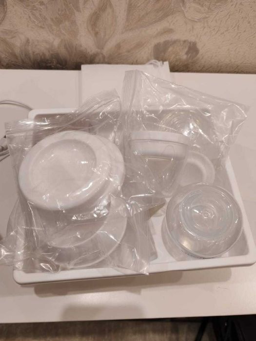 Молокоотсос электронный