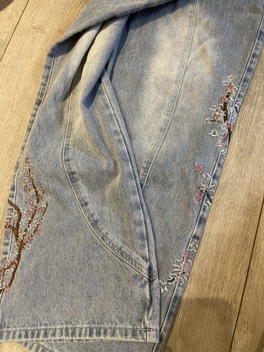 Джинсы сакура,размер L