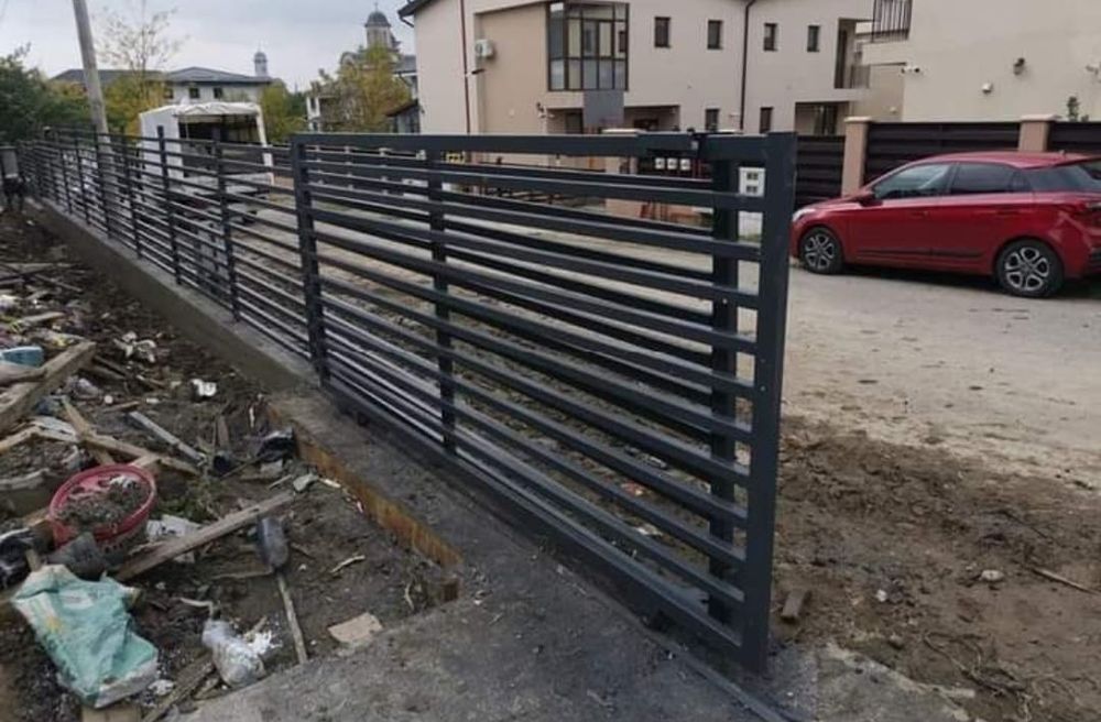 Meseriasi in constructii garduri de peste 10 ani, construim începând de la garduri din sipca metalica, panouri stil jaluzele, tabla cutata, plasă bord