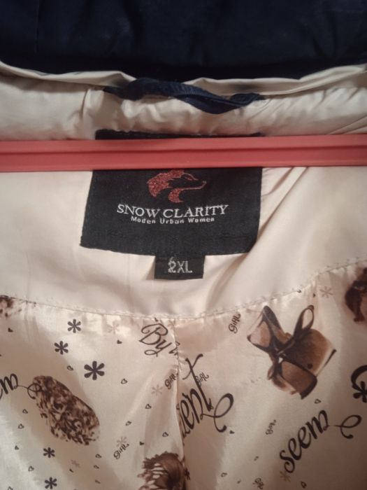 Молочный пуховик