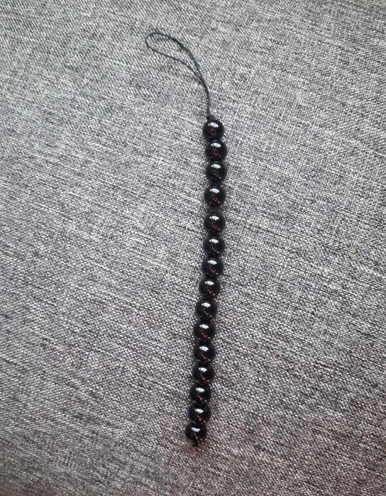 Висулка от оникс за кола