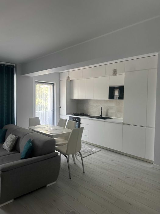 Ofer  spre inchiriere  apartament cu loc parcare si boxa demisol incluse